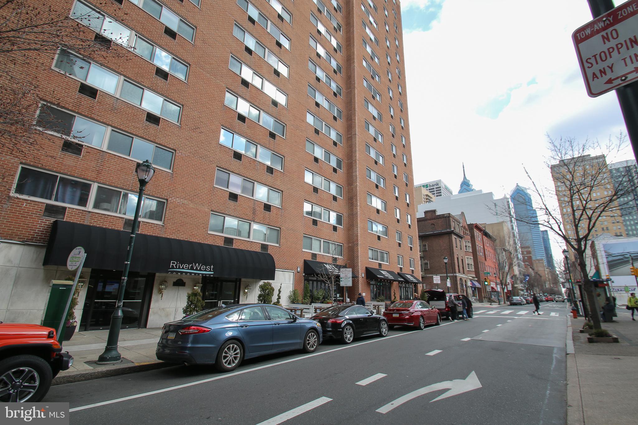 a view of a cars parked in front of a building