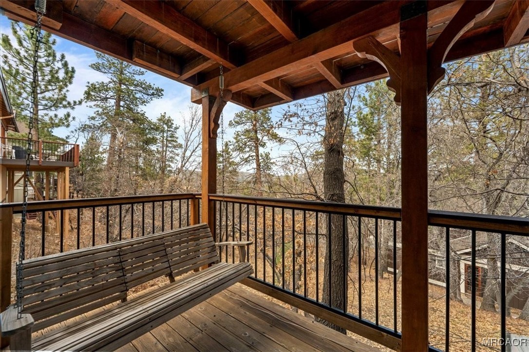 1414 Klamath Road Big Bear City, CA 92314 - Photo 23 of 28 a view of balcony with wooden floor