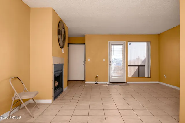 a view of livingroom with furniture and windows