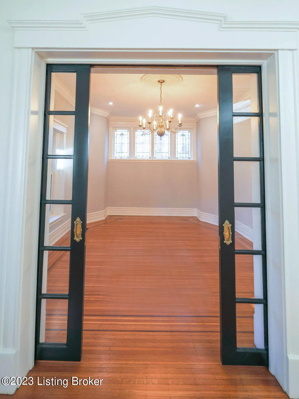 1528 Cherokee Road Louisville, KY 40205 - Photo 24 of 55 Pocket doors into Dining room