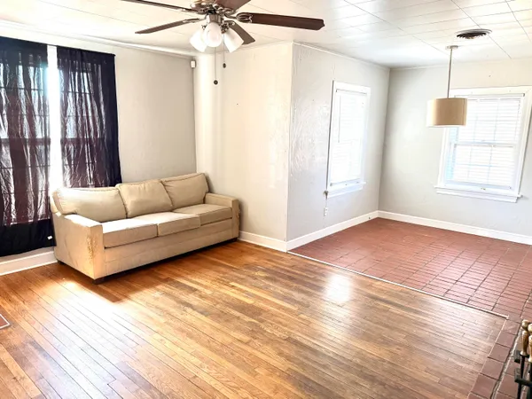 a kitchen with a sink cabinets and window