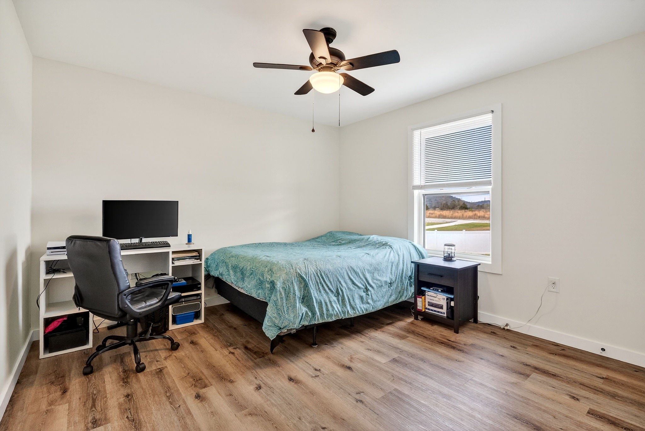 1004 North Spring Street Sparta, TN 38583 - Photo 11 of 30 a bedroom with a bed and a window