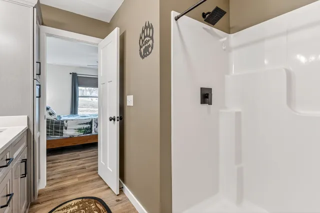 a view of a bedroom from a hallway