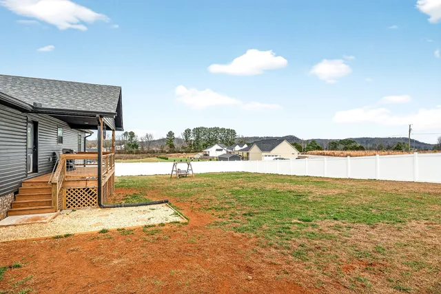 a view of front door of house with outdoor space