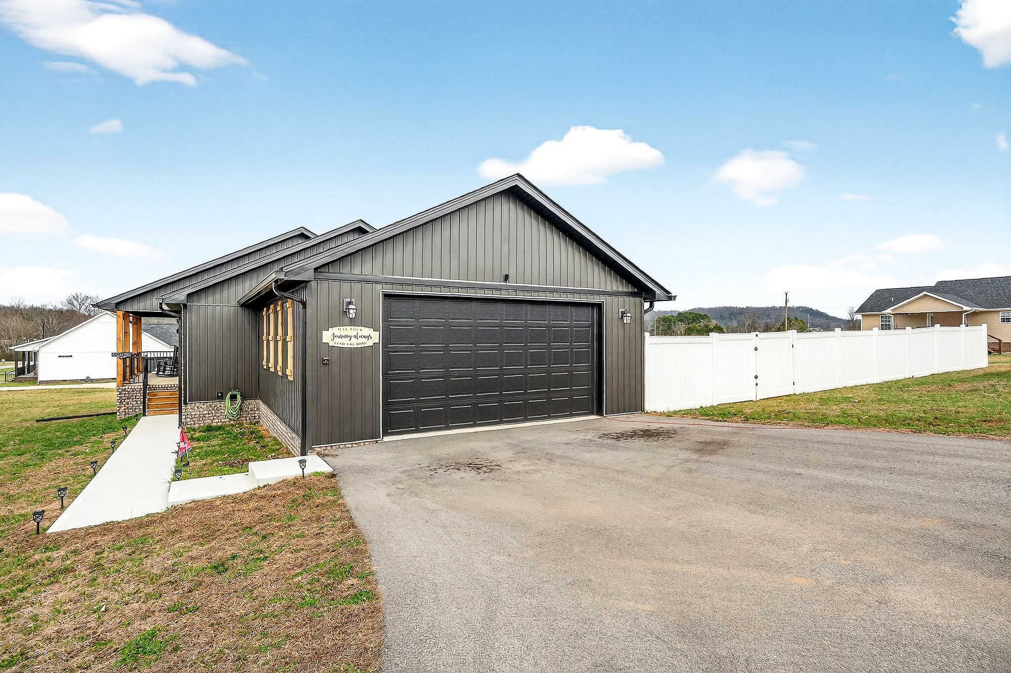 1004 North Spring Street Sparta, TN 38583 - Photo 30 of 30 a view of an house with backyard and road