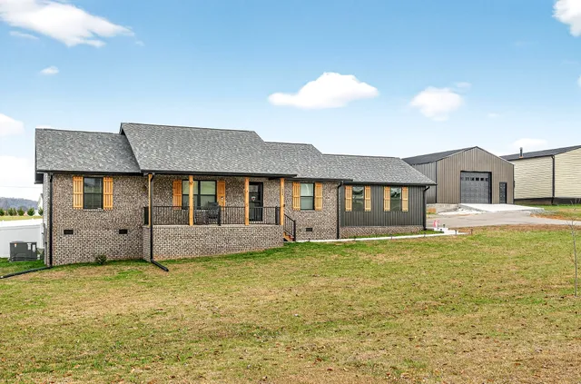 a view of a house with a swimming pool