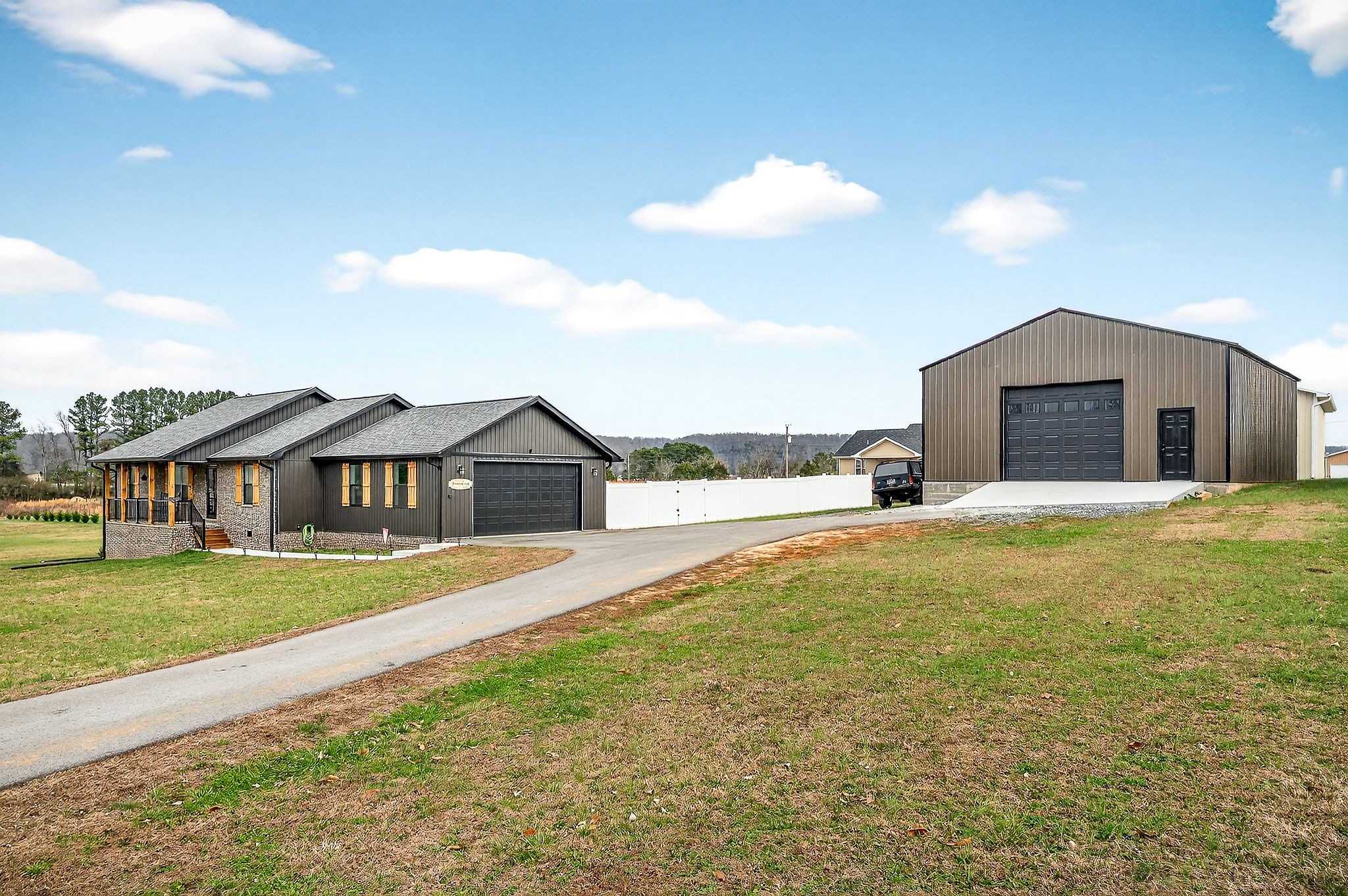 1004 North Spring Street Sparta, TN 38583 - Photo 5 of 30 a front view of a house with a yard