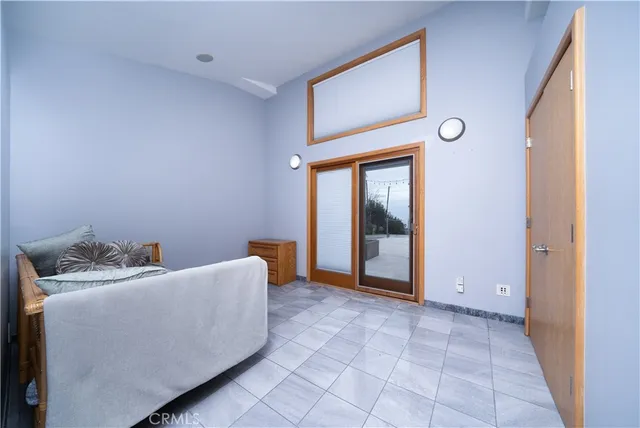 a room with furniture and a window