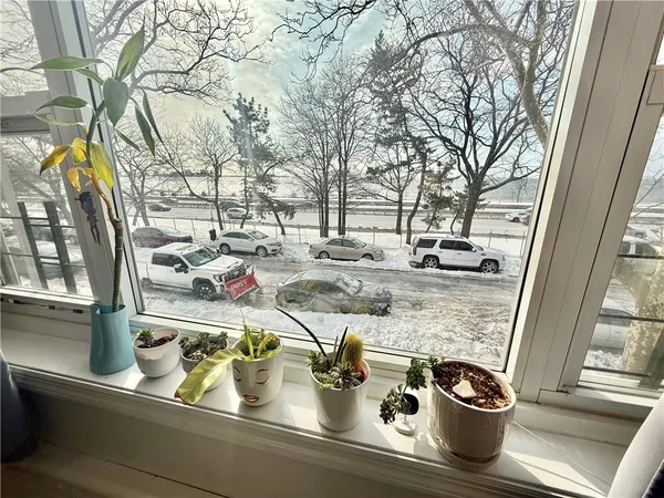 a view of swimming pool with outdoor seating