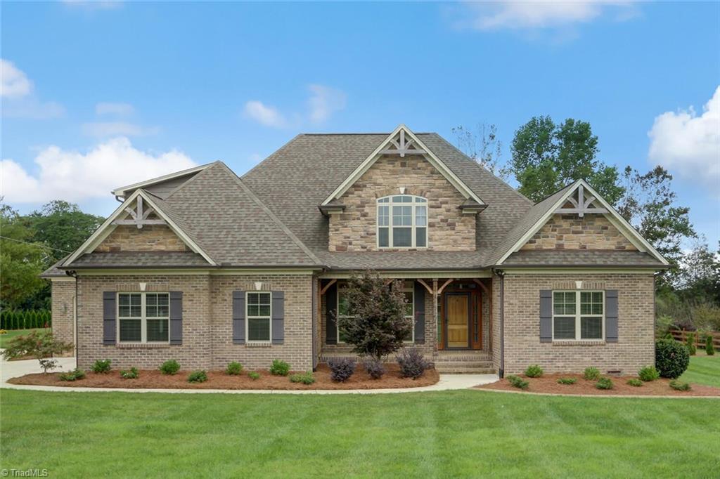 8501 Billet Place Oak Ridge, NC 27310 - Photo 1 of 30 Lush yard meticulously landscaped!