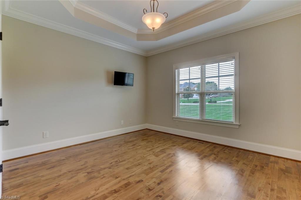 8501 Billet Place Oak Ridge, NC 27310 - Photo 14 of 30 2nd main level bedroom with ensuite bath.