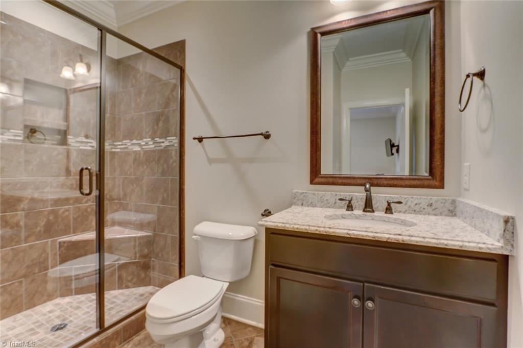 8501 Billet Place Oak Ridge, NC 27310 - Photo 15 of 30 ensuite bath in second bedroom