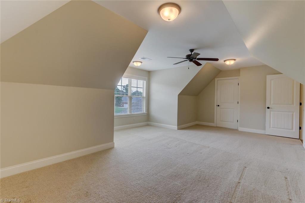 8501 Billet Place Oak Ridge, NC 27310 - Photo 17 of 30 Also, off this bonus room is walk out attic storage that could be finished into additional square footage if needed.