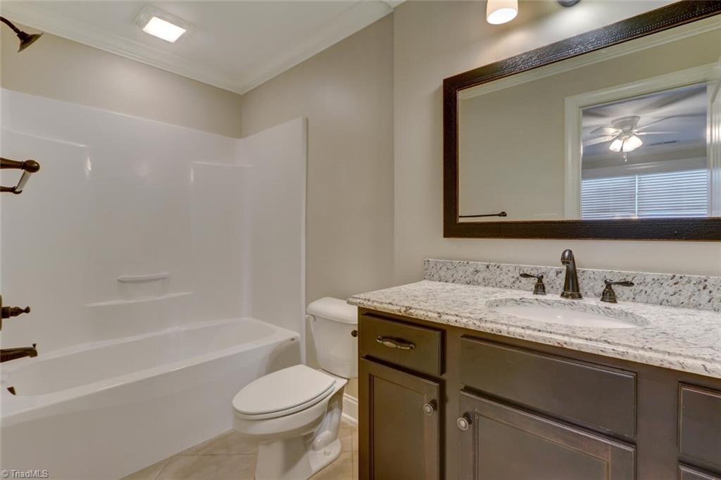 8501 Billet Place Oak Ridge, NC 27310 - Photo 22 of 30 Ensuite bathroom in 3rd bedroom upstairs