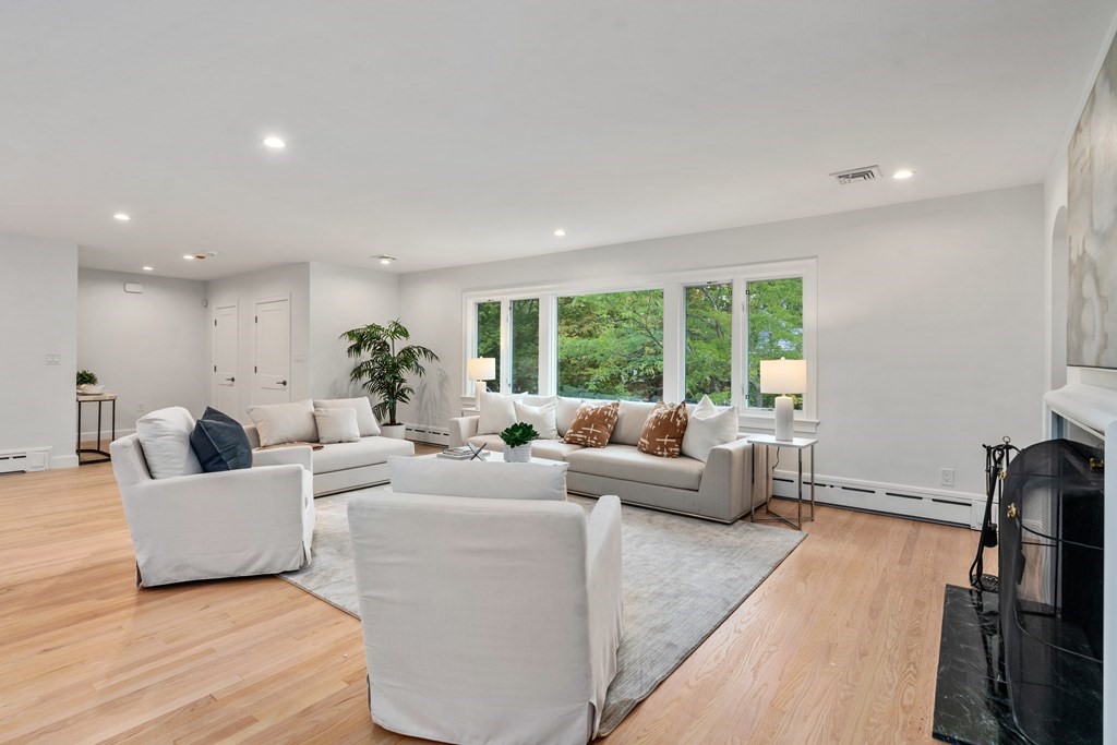 30 Clinton Road Brookline, MA 02445 - Photo 12 of 19 a living room with furniture and a large window