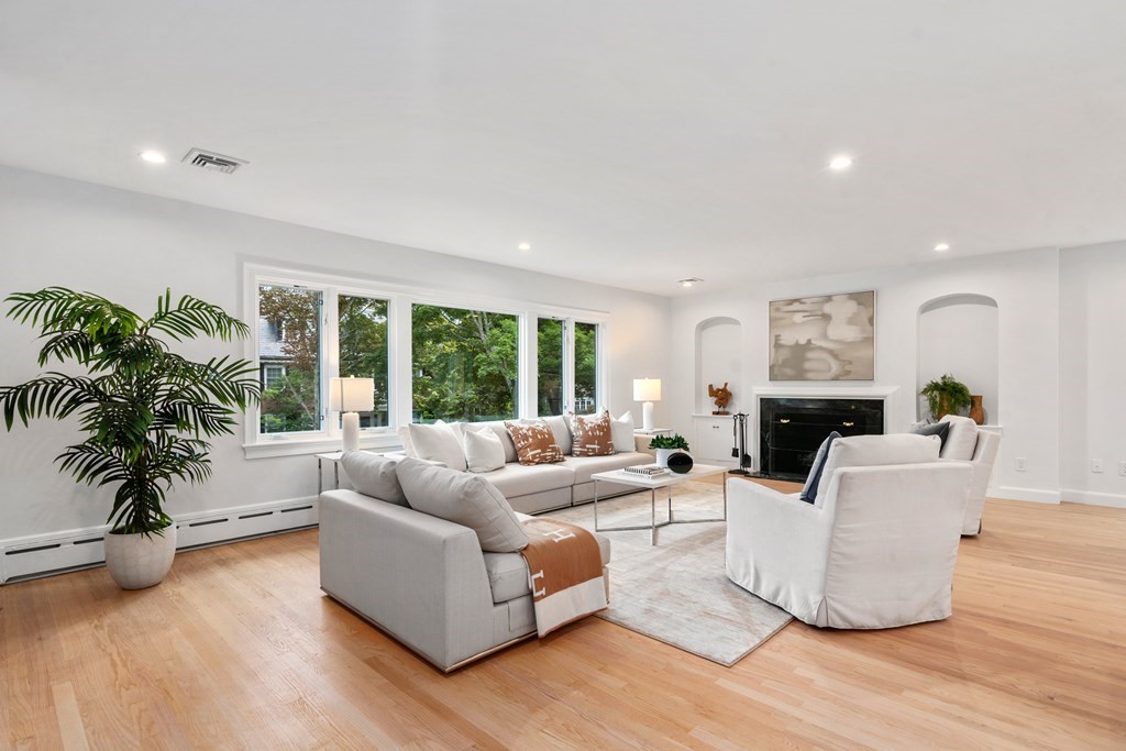 30 Clinton Road Brookline, MA 02445 - Photo 13 of 19 a living room with furniture and a large window