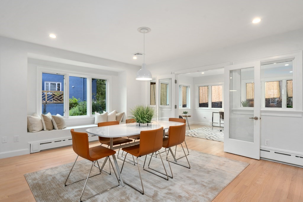 30 Clinton Road Brookline, MA 02445 - Photo 14 of 19 a view of a dining room with furniture window and wooden floor