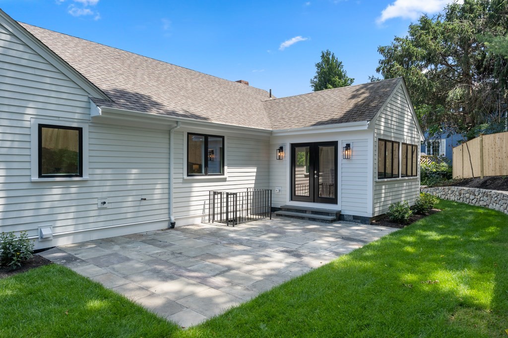 30 Clinton Road Brookline, MA 02445 - Photo 6 of 19 a backyard of a house with seating space
