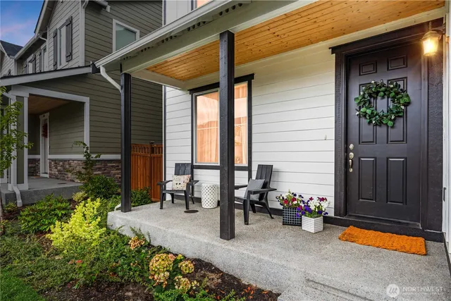 a backyard of a house with seating space