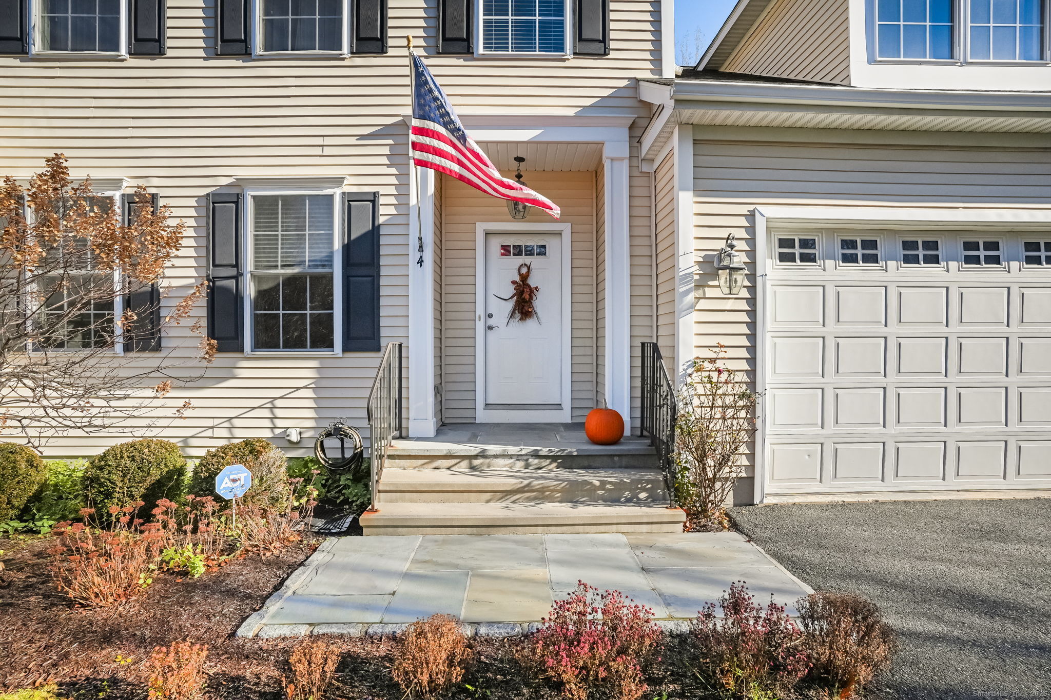 a front view of a house with a outdoor space