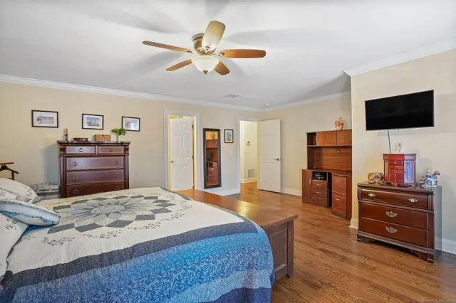 a bed room with a bed and television