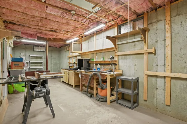 a view of a chairs and table in a room