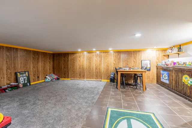 a bed room with a bed and a window