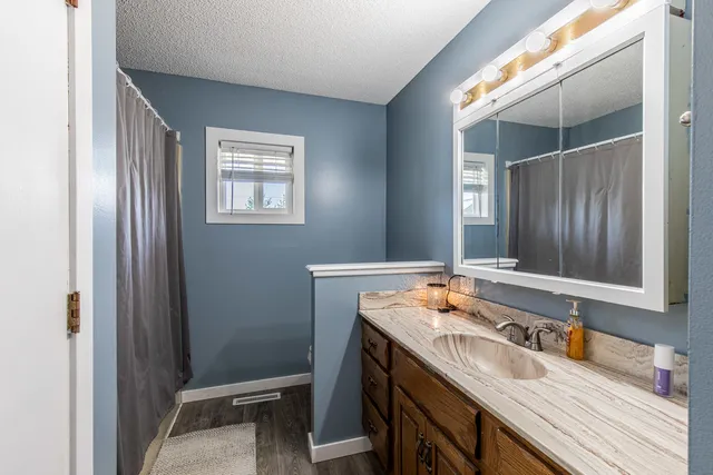 a white refrigerator freezer sitting inside of a kitchen