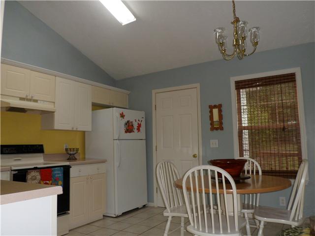 4021 Moss Road Antioch, TN 37013 - Photo 8 of 20 Soaring ceilings and tile floor with utility room entrance from kitchen!