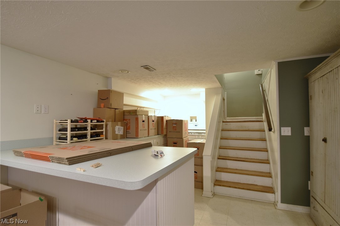 149 North Medina Line Road Akron, OH 44333 - Photo 23 of 36 Kitchenette on the lower level with additional range