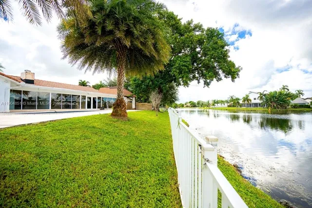 a view of a house with a lake view