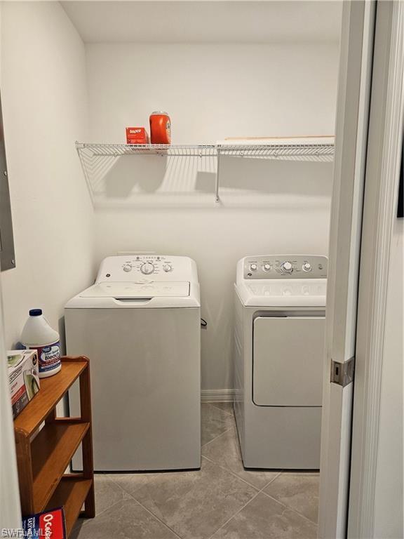 5807 Double Eagle Cir Avenue, Unit 4621 Immokalee, FL 34142 - Photo 23 of 46 Washroom featuring washing machine and dryer and laundry area