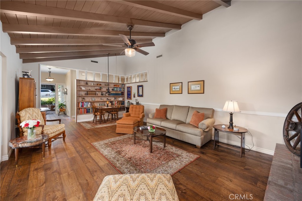 1820 Alta Oaks Drive Arcadia, CA 91006 - Photo 15 of 56 a living room with furniture and a chandelier
