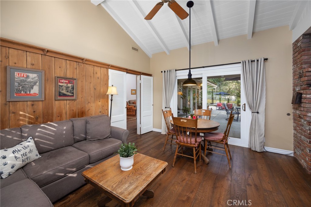 1820 Alta Oaks Drive Arcadia, CA 91006 - Photo 19 of 56 a living room with furniture a wooden floor and a window