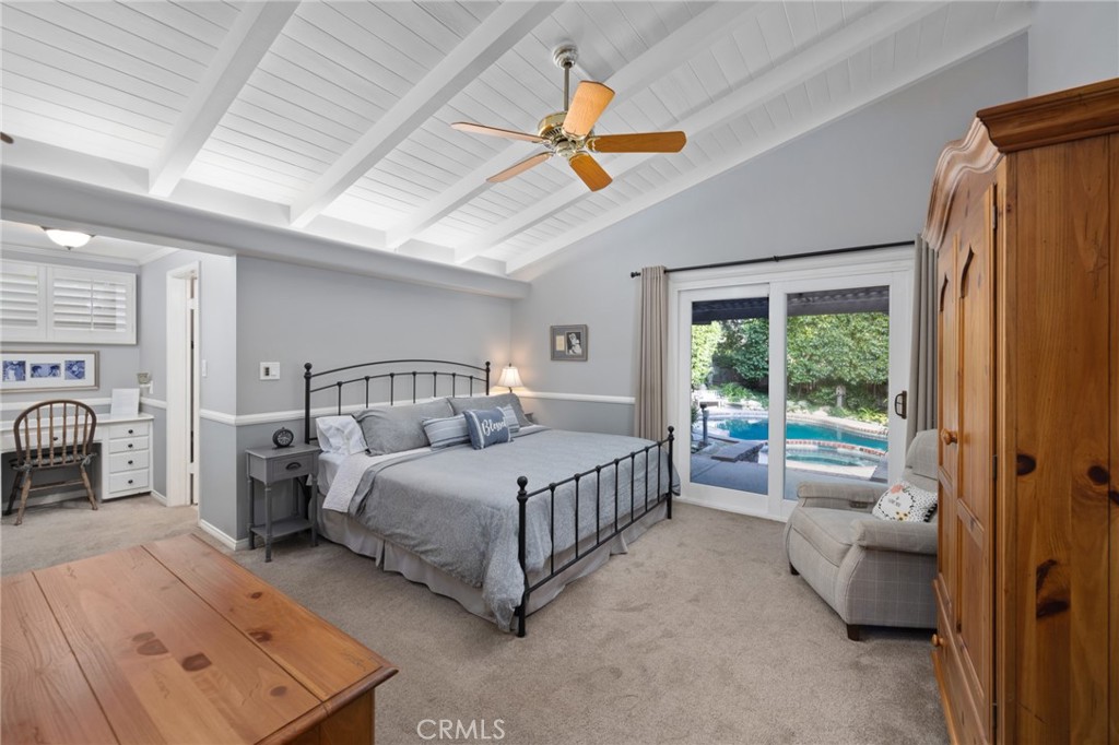 1820 Alta Oaks Drive Arcadia, CA 91006 - Photo 25 of 56 a bedroom with a bed a couch and a window