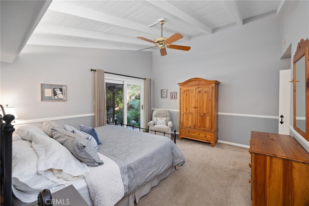 1820 Alta Oaks Drive Arcadia, CA 91006 - Photo 27 of 56 a bedroom with a bed mirror and window
