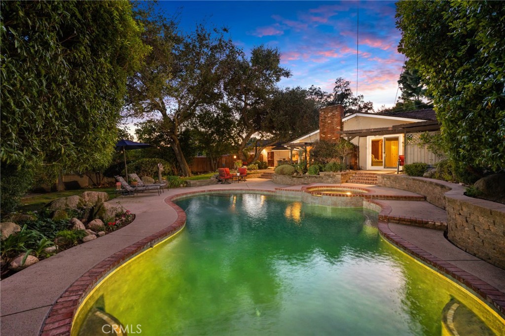 1820 Alta Oaks Drive Arcadia, CA 91006 - Photo 37 of 56 a view of a swimming pool with lounge chair