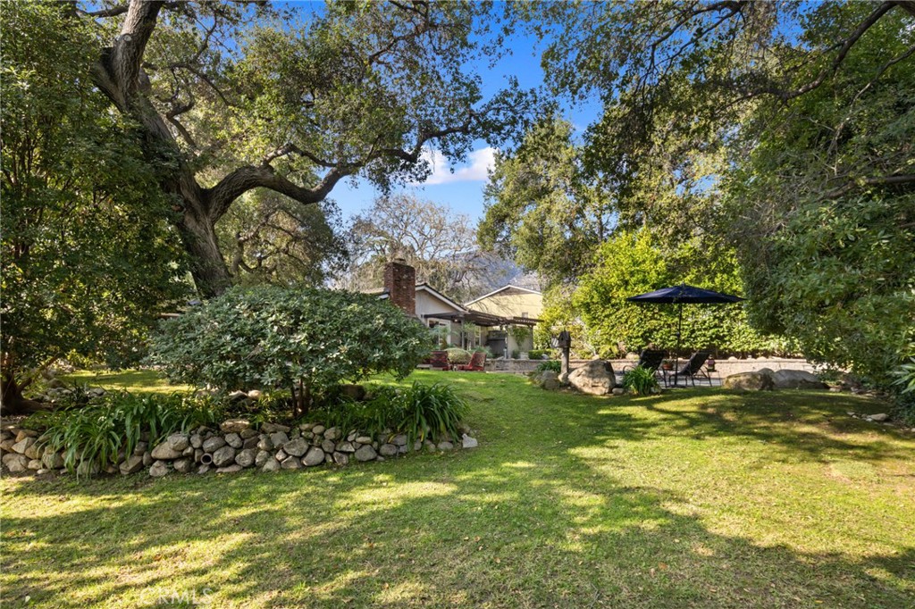 1820 Alta Oaks Drive Arcadia, CA 91006 - Photo 45 of 56 a view of a yard with swimming pool