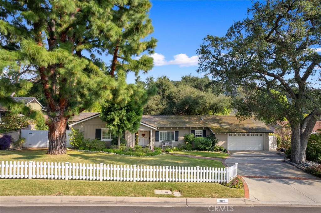 1820 Alta Oaks Drive Arcadia, CA 91006 - Photo 51 of 56 front view of a house with a garden