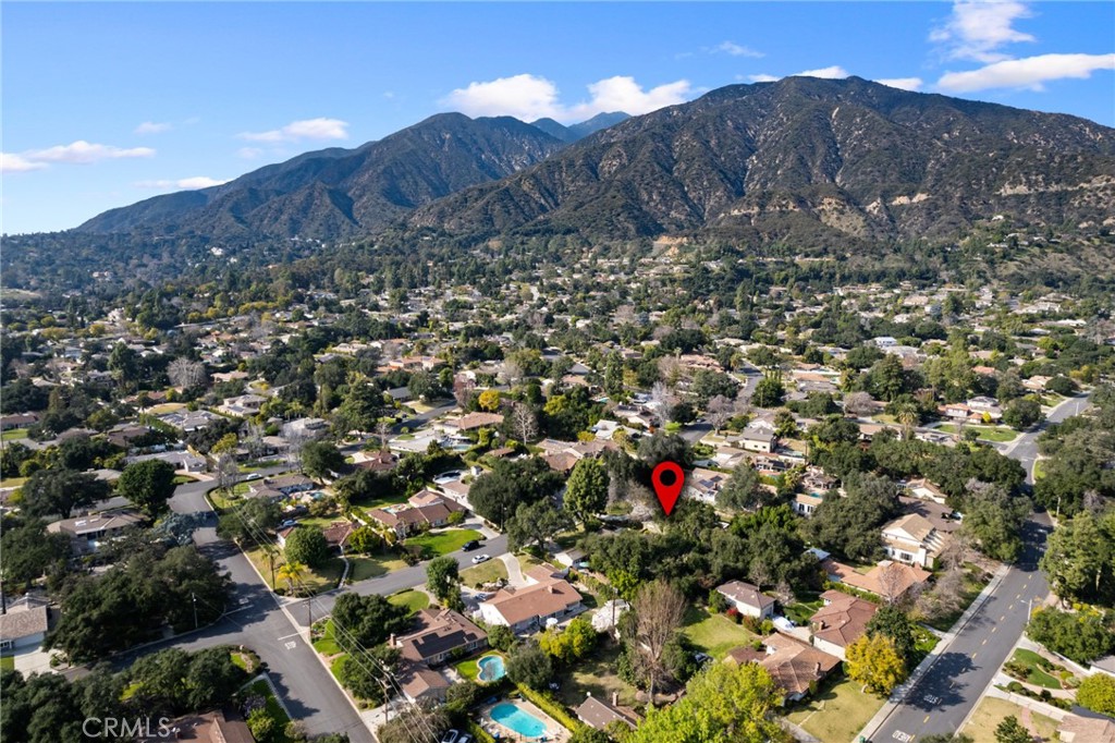 1820 Alta Oaks Drive Arcadia, CA 91006 - Photo 55 of 56 a view of a houses with a lush green hillside