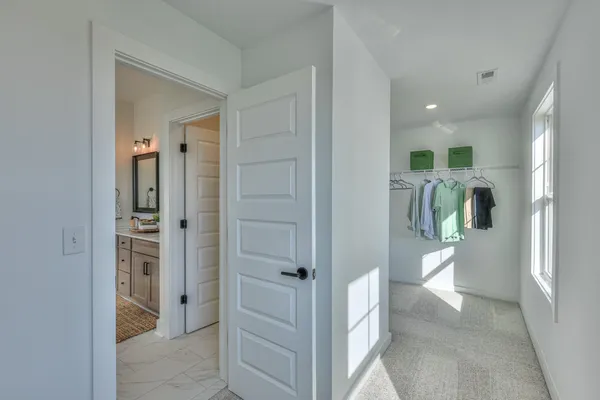 a bathroom with a bathtub and a toilet