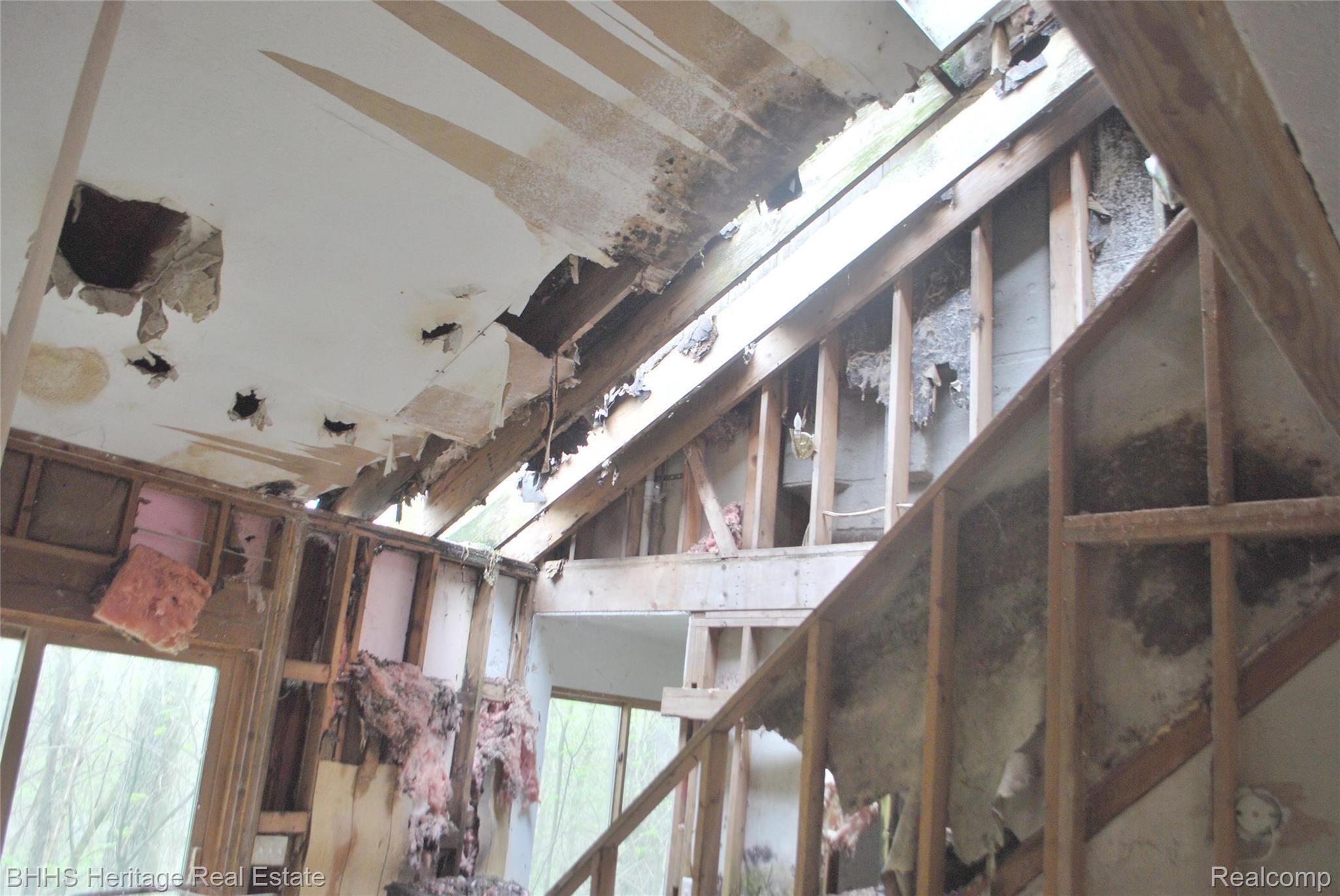 10899 West Allen Road Fowlerville, MI 48836 - Photo 16 of 31 Hole is roof by stair to 2nd level