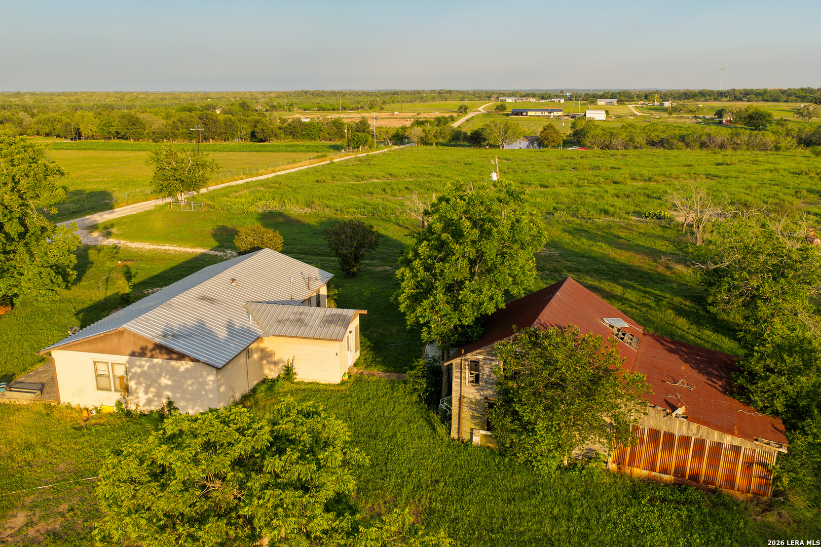 430 Watts Road Kingsbury, TX 78638 - Photo 14 of 37 an aerial view of residential houses with outdoor space