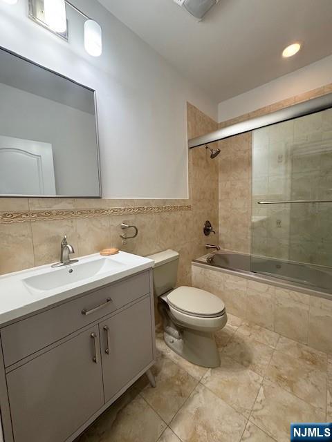 52 Myrtle Avenue, Unit B Edgewater, NJ 07020 - Photo 12 of 20 a bathroom with a sink toilet and shower