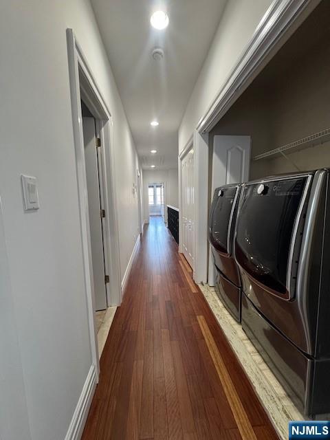 52 Myrtle Avenue, Unit B Edgewater, NJ 07020 - Photo 13 of 20 a hallway with wooden floor and stairs