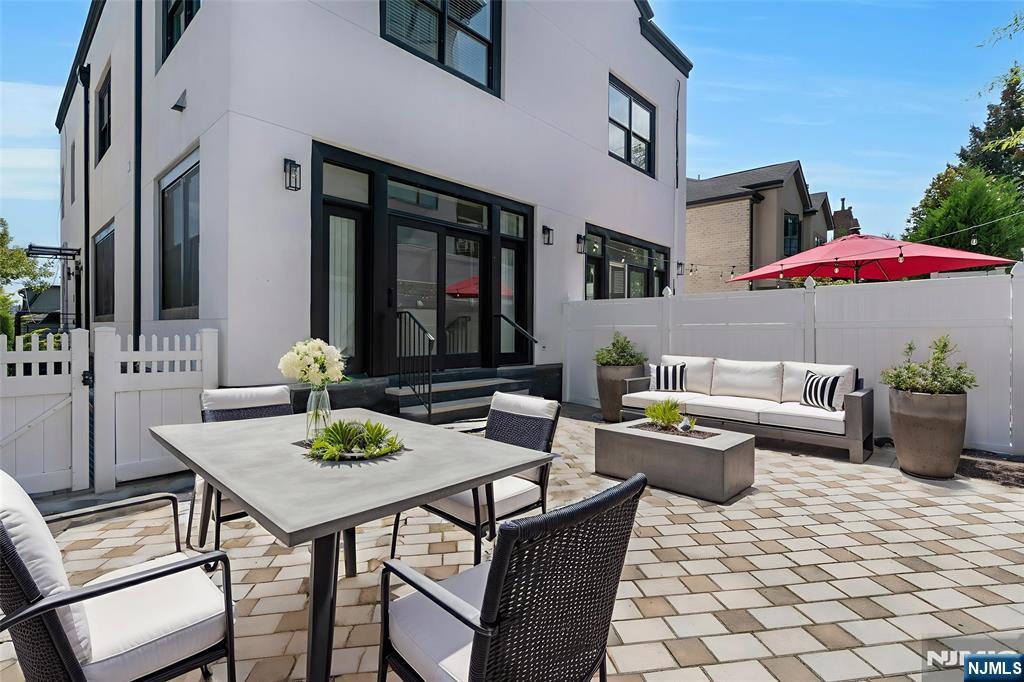 52 Myrtle Avenue, Unit B Edgewater, NJ 07020 - Photo 18 of 20 a view of a patio with furniture