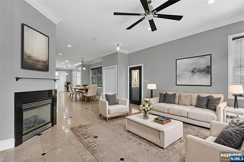 52 Myrtle Avenue, Unit B Edgewater, NJ 07020 - Photo 3 of 20 a living room with furniture a fireplace