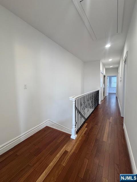 52 Myrtle Avenue, Unit B Edgewater, NJ 07020 - Photo 6 of 20 a view of a hallway with wooden floor