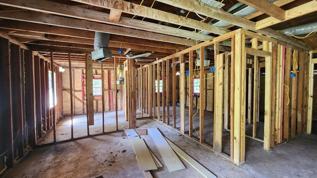 26835 Long Street Splendora, TX 77372 - Photo 9 of 16 a view of a room with wooden walls