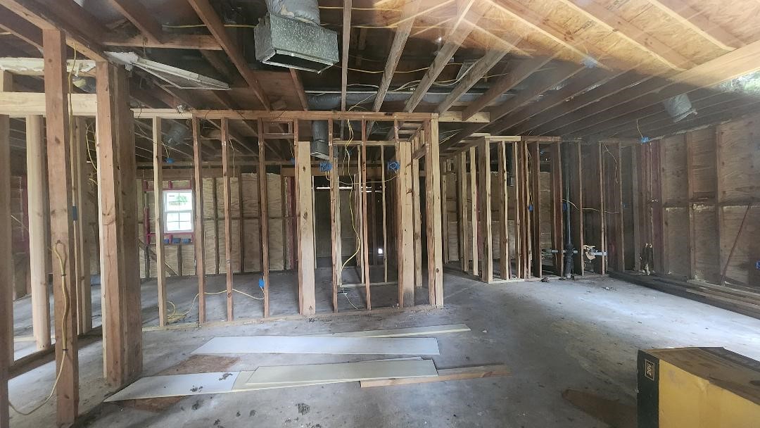 26835 Long Street Splendora, TX 77372 - Photo 10 of 16 a view of an empty room with wooden frame